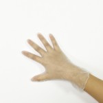 Clear powdered disposable Vinyl examination gloves